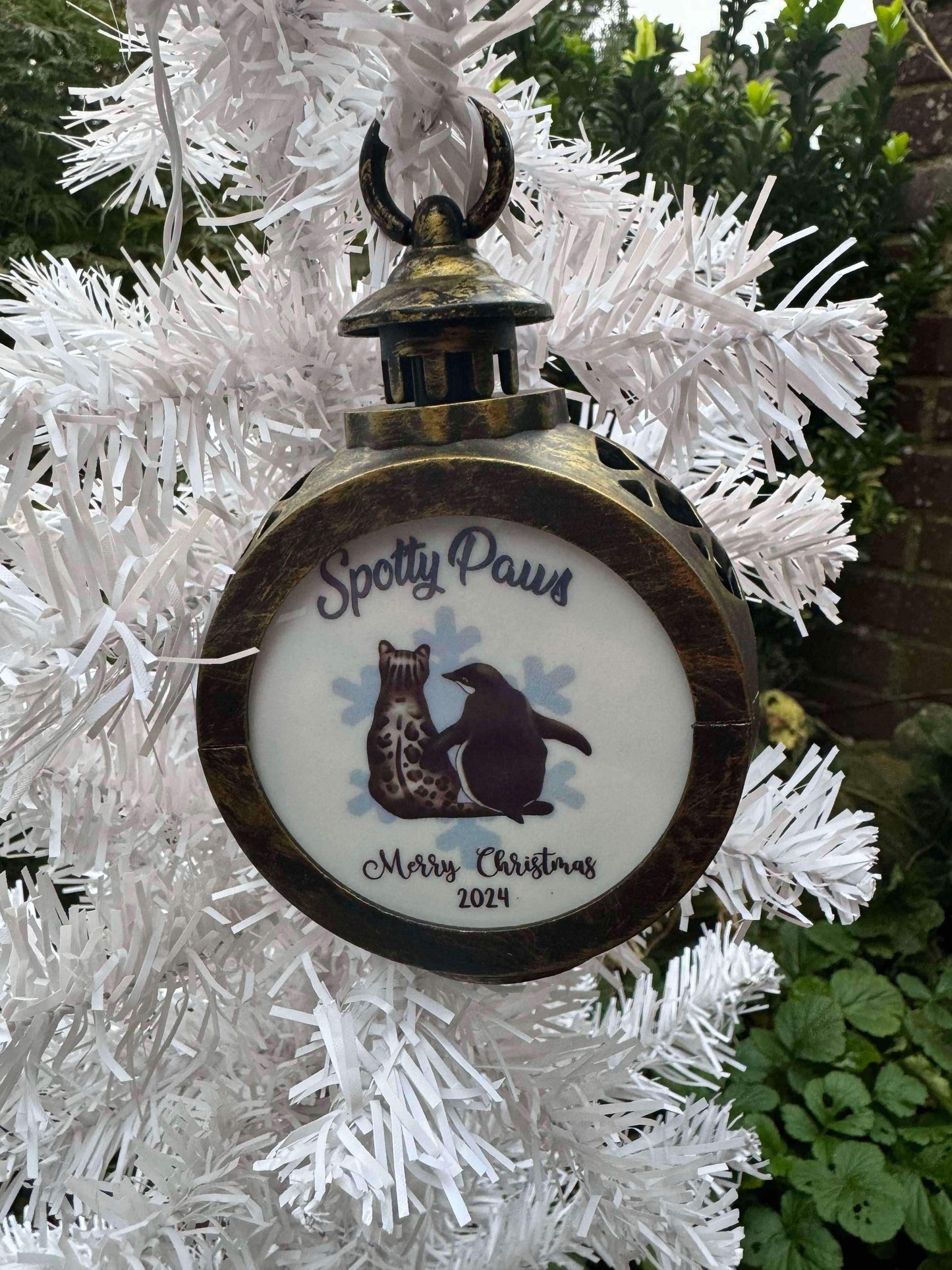 Exclusive annual 2024 Spotty Paws Christmas lantern.