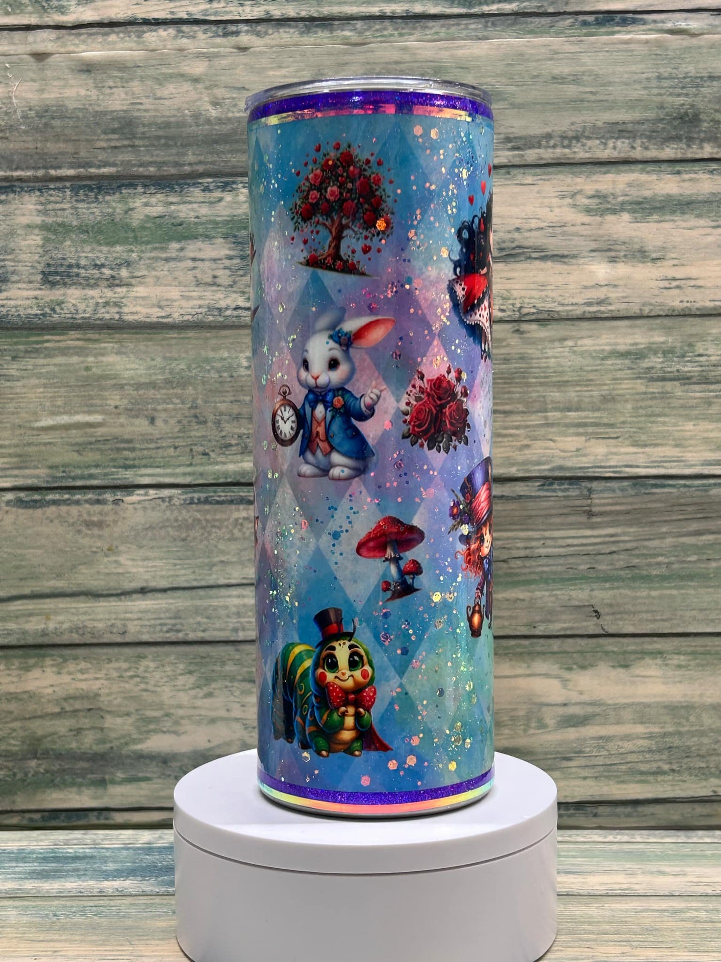 20oz Alice in wonderland tumbler.