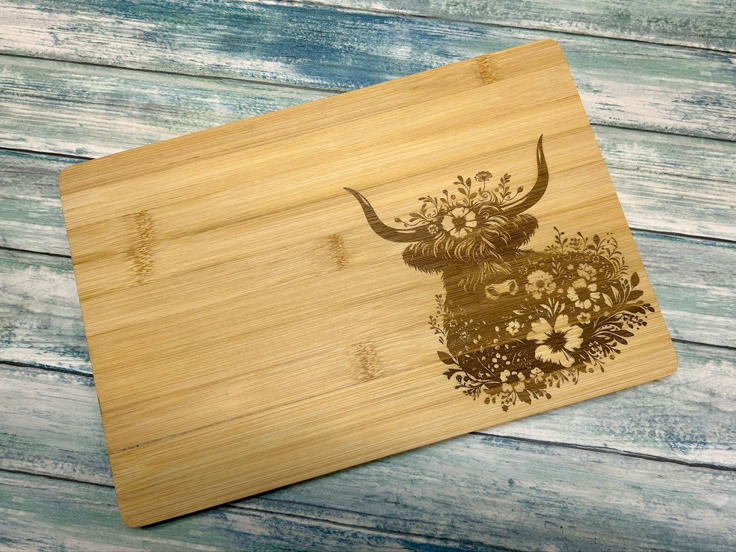 Beautiful engraved Bamboo chopping board (size large)