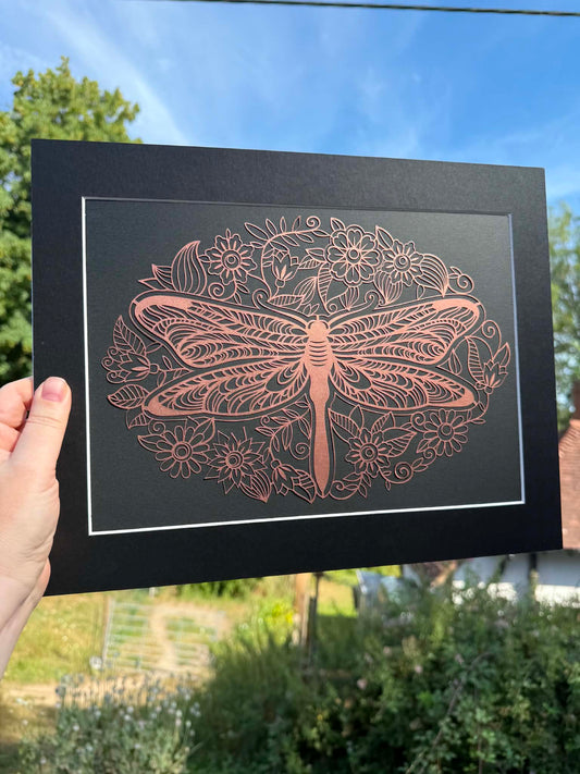 Bronze ornate dragonfly papercut.