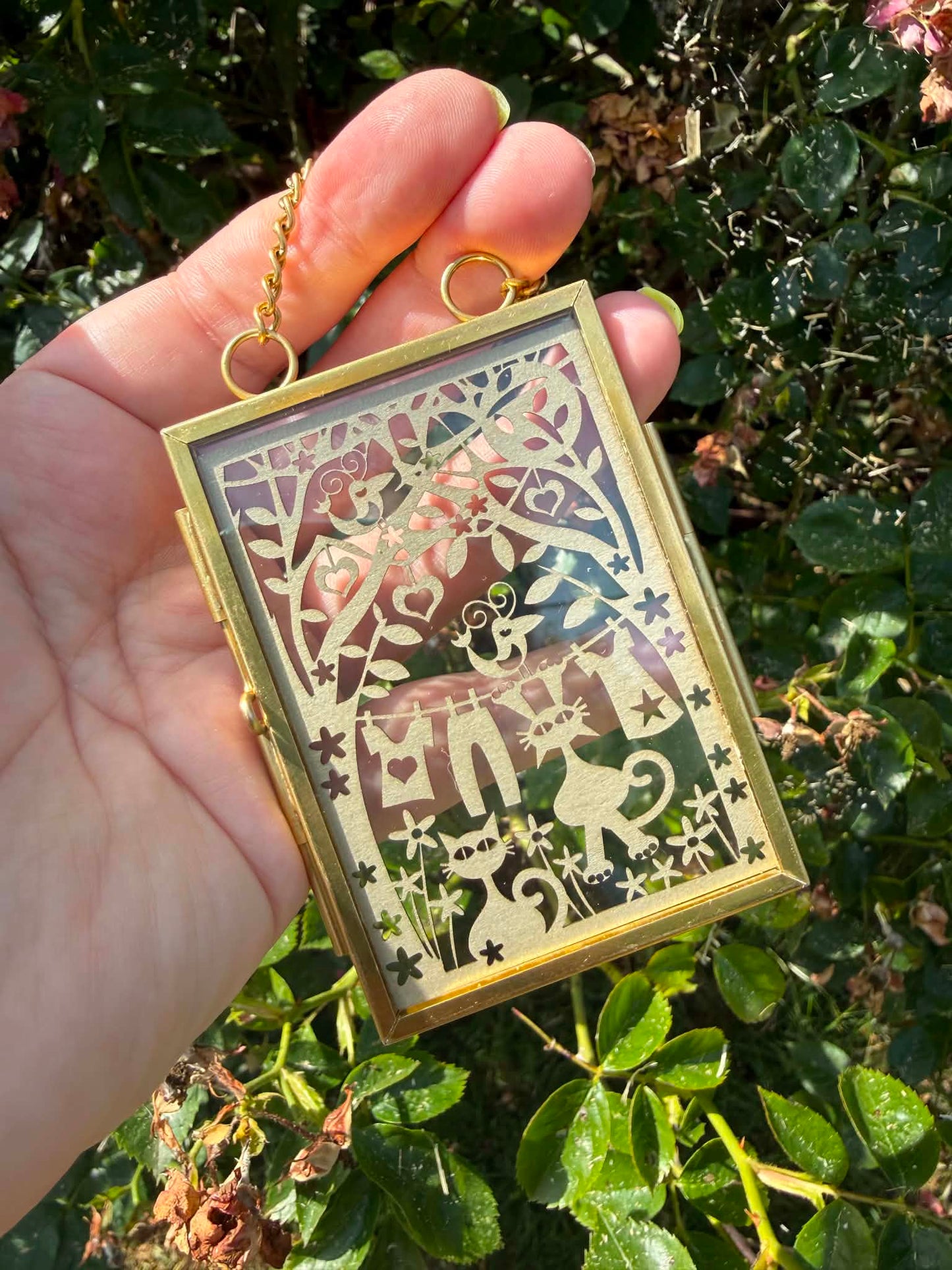 Quaint mini intricate cat paper cuts.